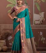 Peacock green tussar silk handloom weaving temple border saree