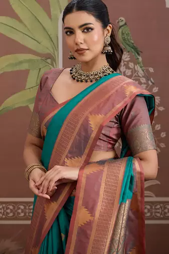 Peacock green tussar silk handloom weaving temple border saree