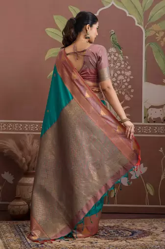 Peacock green tussar silk handloom weaving temple border saree