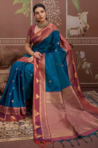 Peacock blue tussar silk handloom weaving temple border saree
