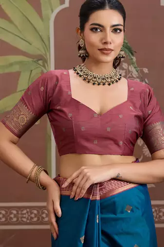 Peacock blue tussar silk handloom weaving temple border saree