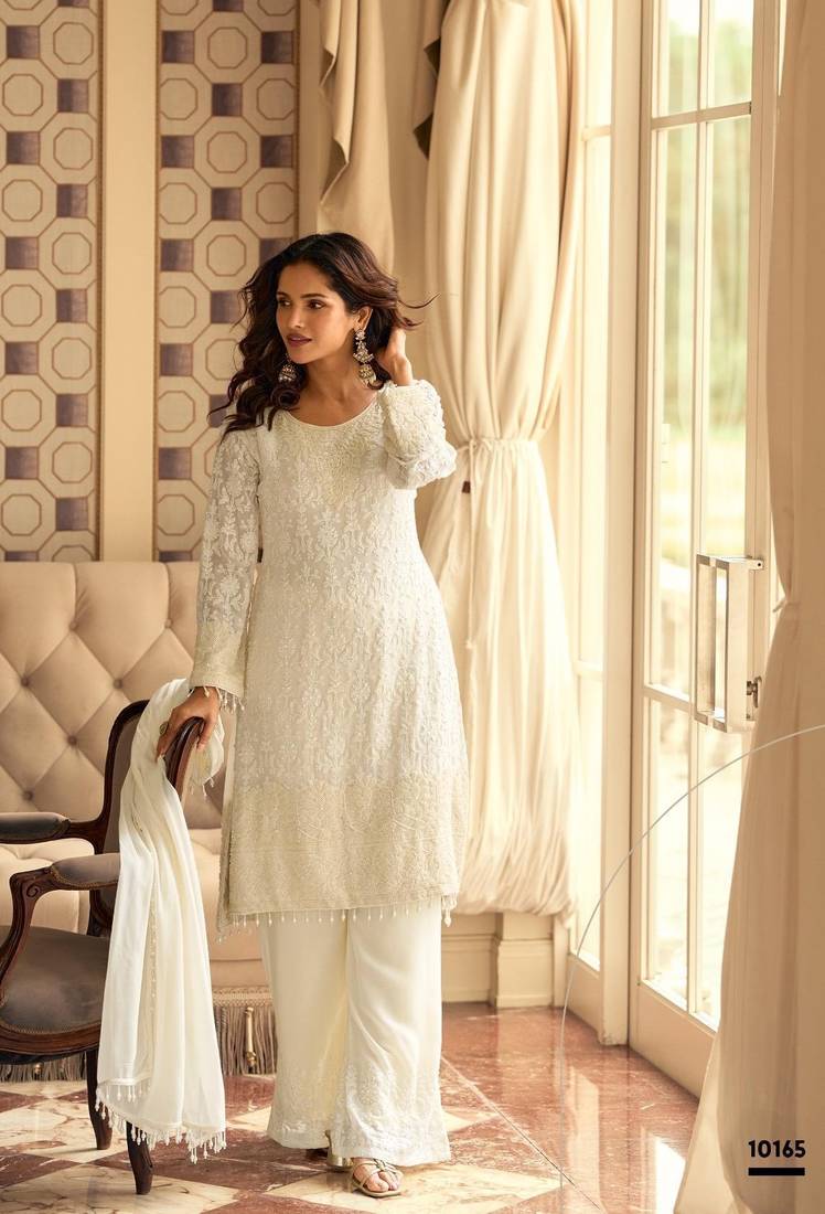 White georgette free size stitched suit with embroidery & beads work