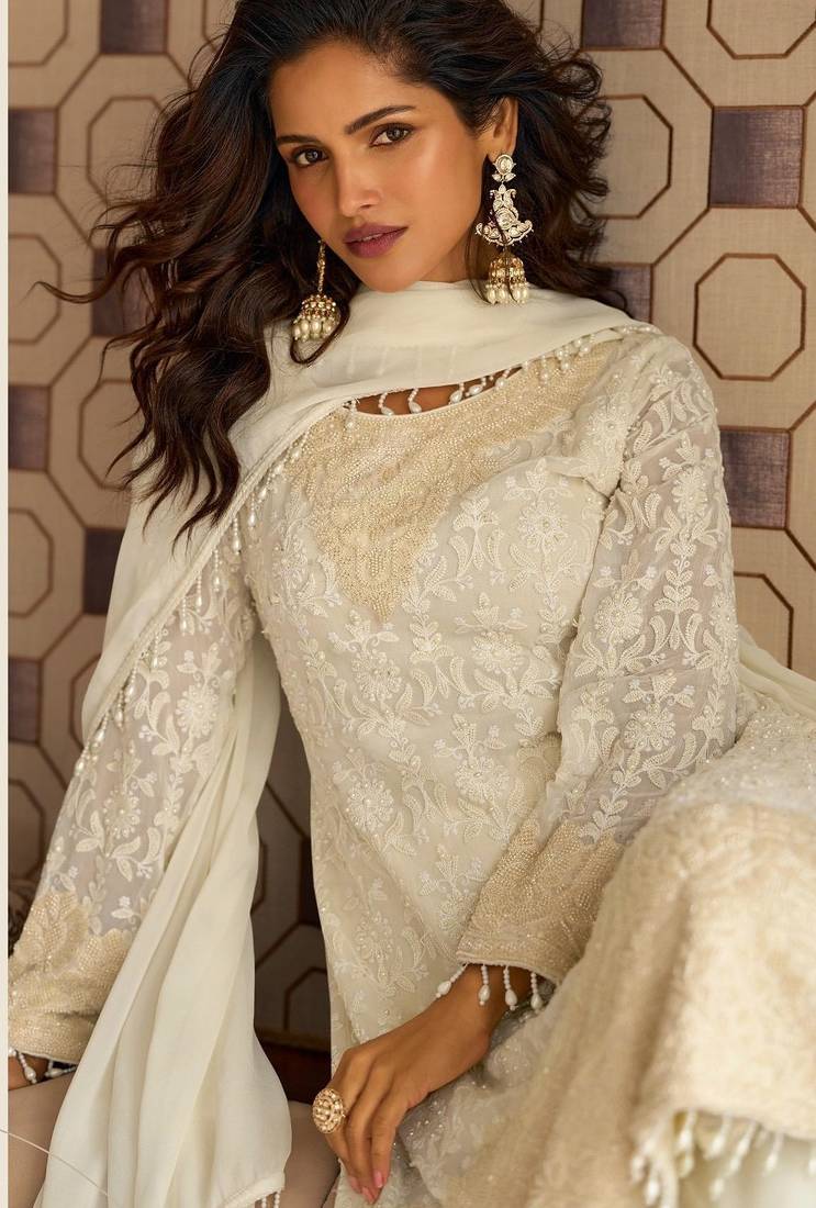 White georgette free size stitched suit with embroidery & beads work