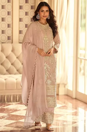 Peach georgette free size stitched suit with embroidered beads 
