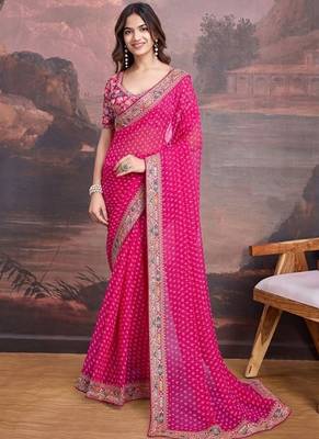Pink embriodered lace georgette bollywood saree with blouse piece. 1