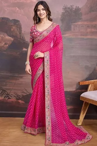 Pink embriodered lace georgette bollywood saree with blouse piece.