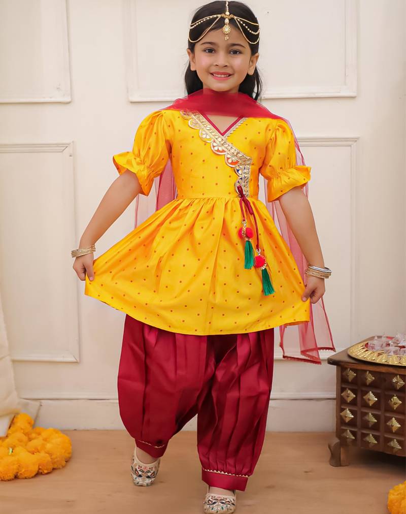 Yellow woven lurex silk top with afgani salwar and dupatta set for girls