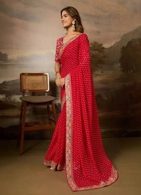 Red embriodered lace georgette bollywood saree with blouse piece. 3