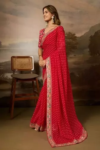 Red embriodered lace georgette bollywood saree with blouse piece.