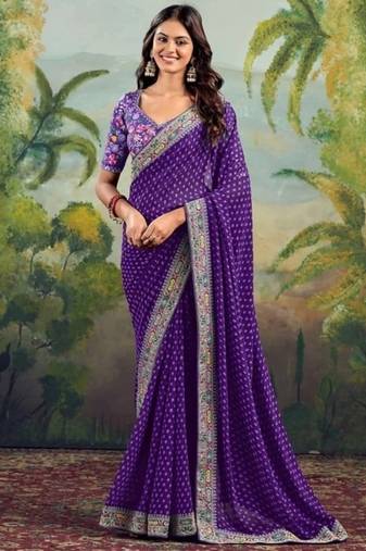 Purple embriodered lace georgette bollywood saree with blouse piece.
