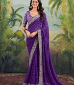 Purple embriodered lace georgette bollywood saree with blouse piece.