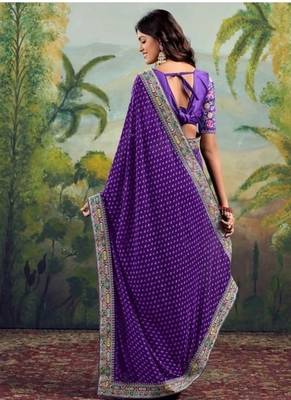 Purple embriodered lace georgette bollywood saree with blouse piece. 3