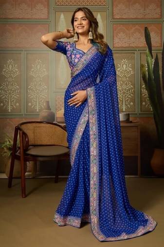 Blue embriodered lace georgette bollywood saree with blouse piece.