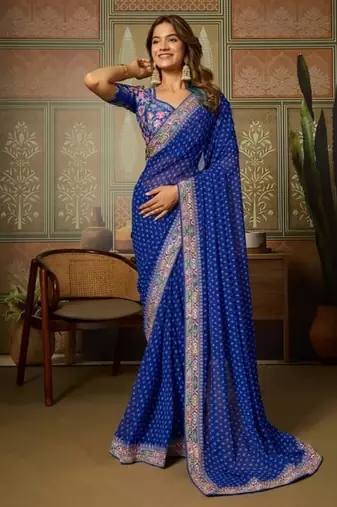 Blue embriodered lace georgette bollywood saree with blouse piece.