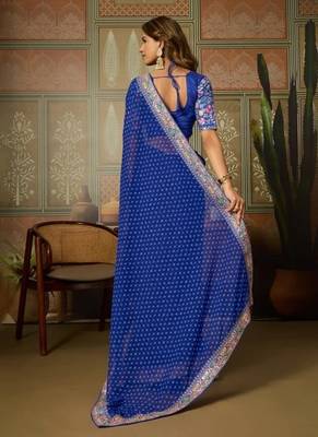 Blue embriodered lace georgette bollywood saree with blouse piece. 2