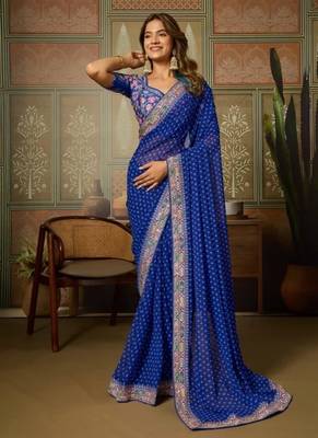 Blue embriodered lace georgette bollywood saree with blouse piece. 3