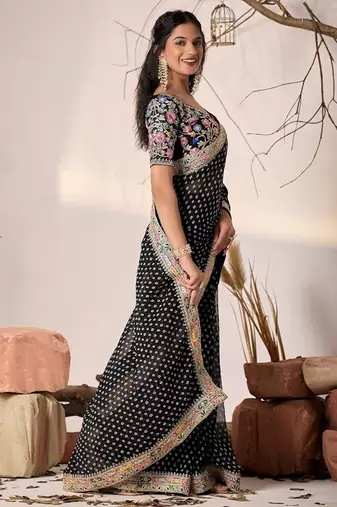 Black embriodered lace georgette bollywood saree with blouse piece.