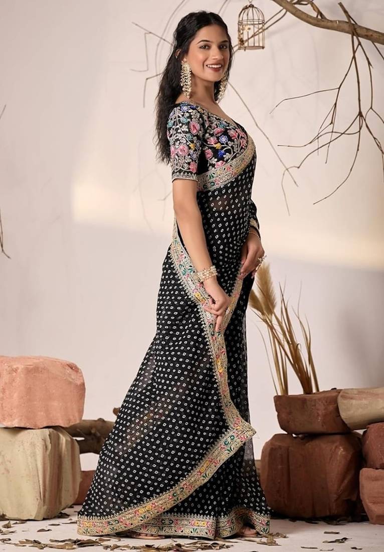Black embriodered lace georgette bollywood saree with blouse piece.