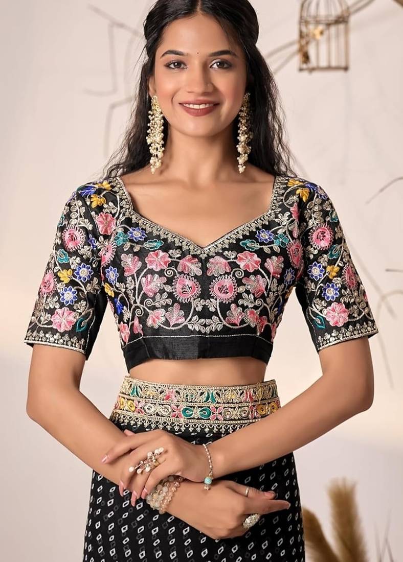 Black embriodered lace georgette bollywood saree with blouse piece.