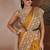 Mustard printed satin saree