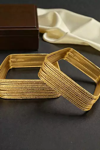 Set of 24 gold plated square shimmer bangle set