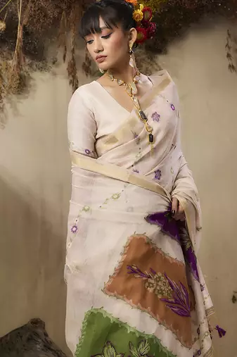 Cotton blend woven cream saree