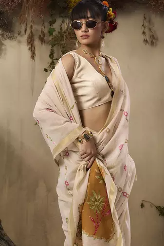 Cotton blend woven cream saree