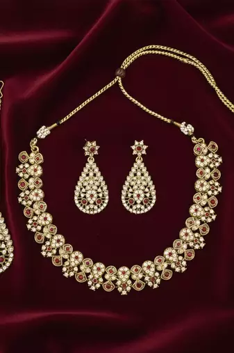 Gold plated traditional floral necklace set with earrings & maangtikka for women