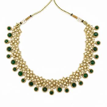 Gold plated traditional kundan-style necklace set with earrings & maangtikka 4