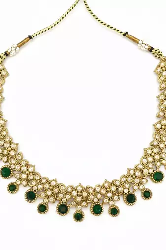 Gold plated traditional kundan-style necklace set with earrings & maangtikka