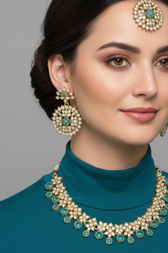 Gold plated traditional kundan-style necklace set with earrings & maangtikka