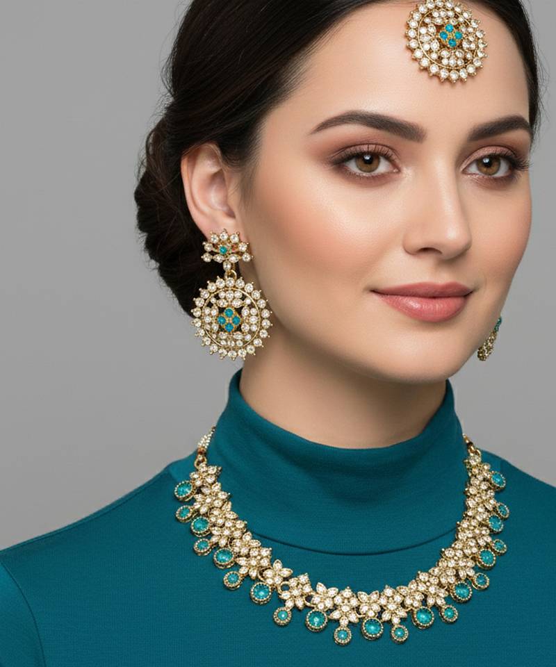 Gold plated traditional kundan-style necklace set with earrings & maangtikka
