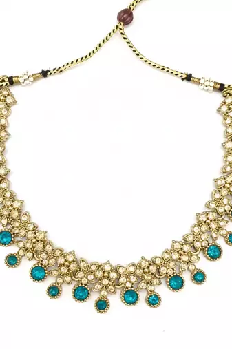 Gold plated traditional kundan-style necklace set with earrings & maangtikka