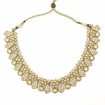 Gold plated traditional kundan-style necklace set with earrings & maangtikka 4
