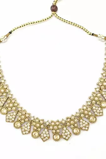 Gold plated traditional kundan-style necklace set with earrings & maangtikka