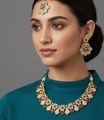 Gold plated traditional kundan-style necklace set with earrings & maangtikka