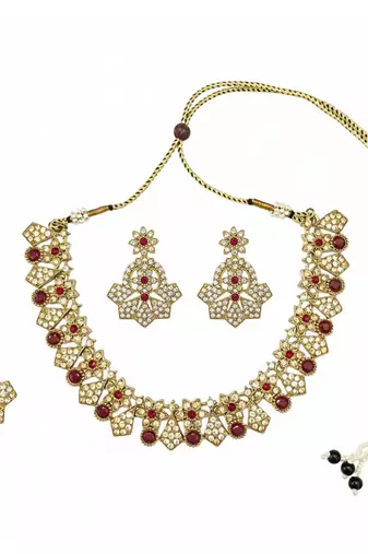 Gold plated traditional kundan-style necklace set with earrings & maangtikka
