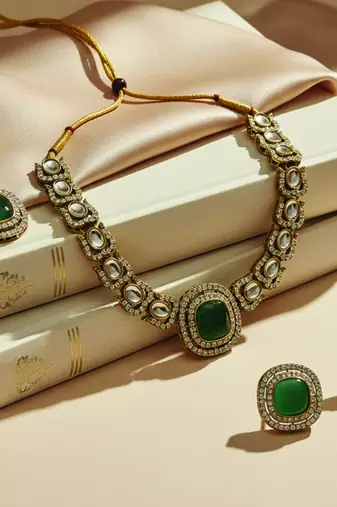 Gold plated traditional kundan-style necklace set with earrings & maangtikka