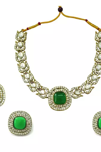 Gold plated traditional kundan-style necklace set with earrings & maangtikka