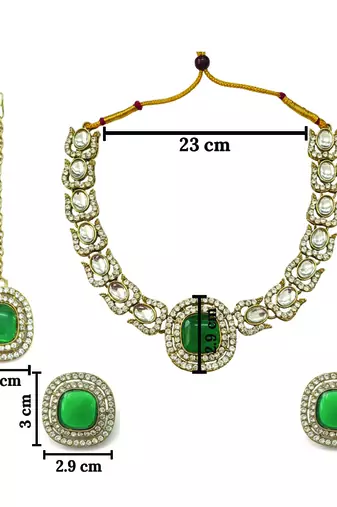 Gold plated traditional kundan-style necklace set with earrings & maangtikka