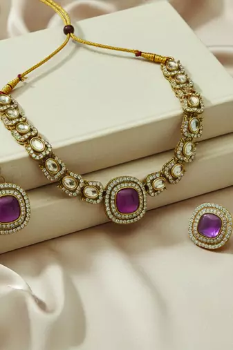 Gold plated traditional kundan-style necklace set with earrings & maangtikka