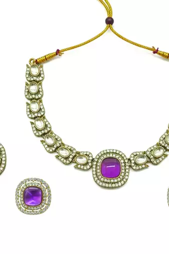 Gold plated traditional kundan-style necklace set with earrings & maangtikka