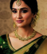 Gold plated traditional bridal kundan-style necklace set with earrings & maangtikka