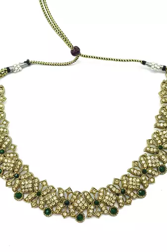Gold plated traditional bridal kundan-style necklace set with earrings & maangtikka