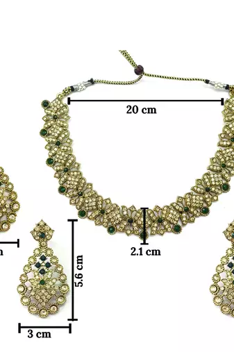 Gold plated traditional bridal kundan-style necklace set with earrings & maangtikka