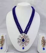 Traditional handcrafted ethnic blue beaded necklace set with gold plated finish & studded stones