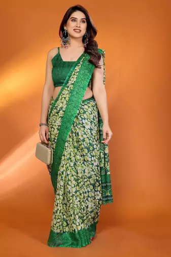 green floral printed chiffon saree with rich border design