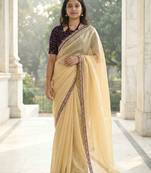 yellow fendy silk saree with contrast lace border
