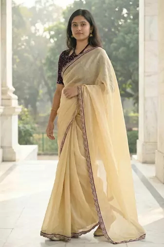 yellow fendy silk saree with contrast lace border