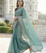 green fendy silk saree with contrast lace border